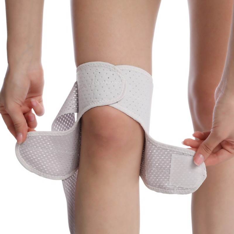Orthopedic Knee Brace with Stabilizing Strap